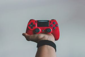 Controller stands charging gamepads between sessions